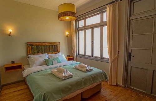 Konak House | 1901 CLOCK TOWER ROOM – Spacious, Bright, and Comfortable with Unobstructed Ocea