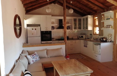 Demre House | Old village restored stone house with gardens and parking.