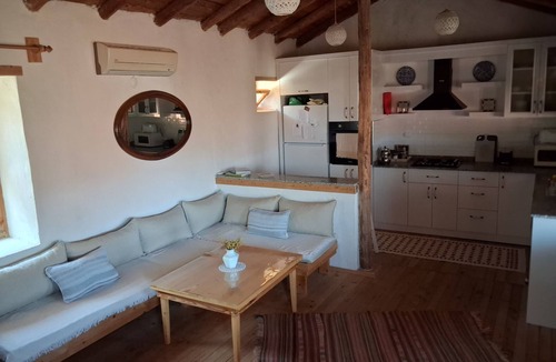 Demre House | Old village restored stone house with gardens and parking.