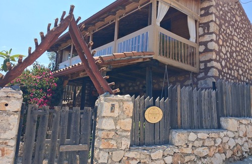Demre House | Old village restored stone house with gardens and parking.