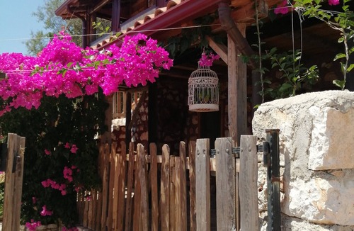 Demre House | Old village restored stone house with gardens and parking.