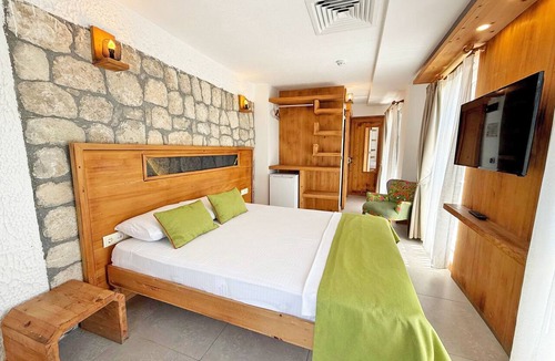 Bozcaada Hotel | Onal Tas Konak