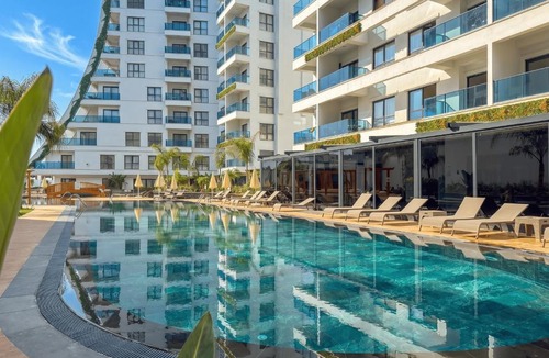Seki Apartment | Qoople Green Ocean One-Bedroom Apartments - Your Cozy Home by the Mediterranean Sea