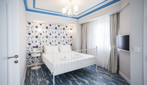 Deluxe Suite, 2 Bedrooms, Balcony, Garden View
