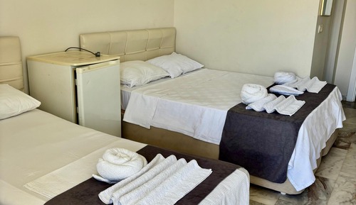 Economy Triple Room, Balcony, Beach View