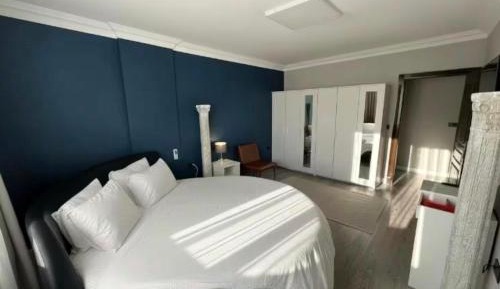 Three-Bedroom Premium Apartment with Balcony
