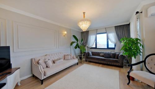Three-Bedroom Apartment with Sea View