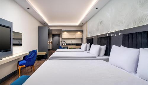 Superior Room with One Double and Two Single Beds - Non-Smoking