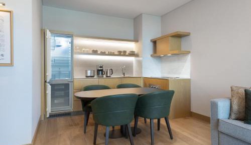 One-Bedroom King Apartment with Sofa Bed and City or Forest View