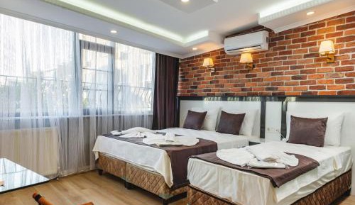 Deluxe Triple Room with Sea View
