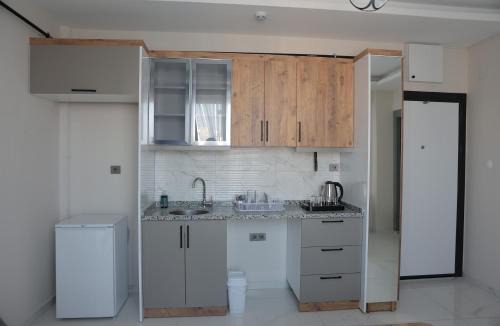 Tomuk Belediyesi Apartment | Imperium Resort Hotel