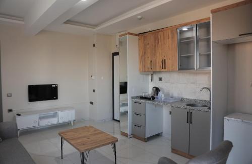 Tomuk Belediyesi Apartment | Imperium Resort Hotel