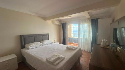 Kucukkuyu Hotel | Deniz Kenarı Beach & Garden